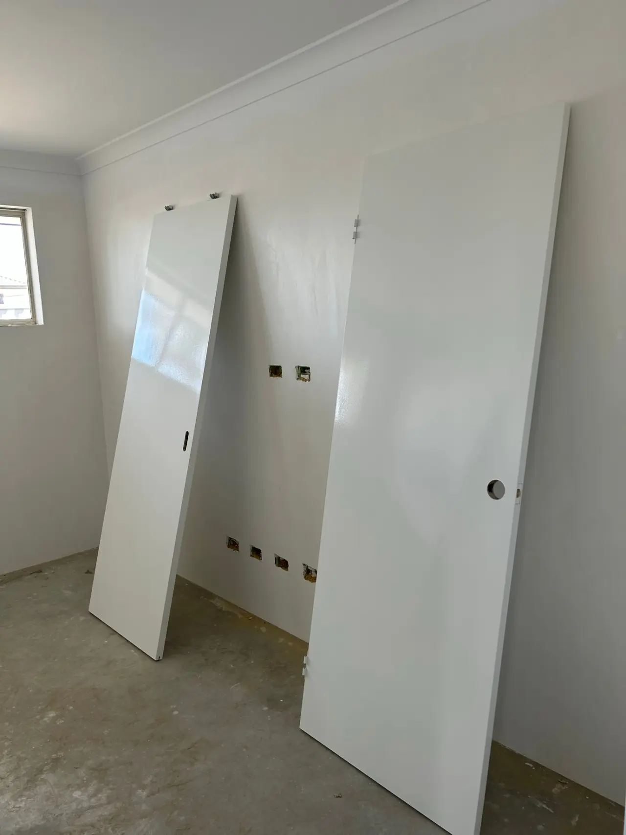 Interior wall preparation and painting in a Perth home